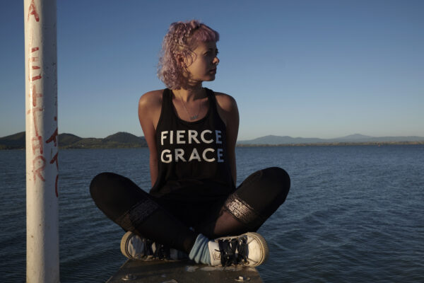 Fierce grace yoga girl by sea