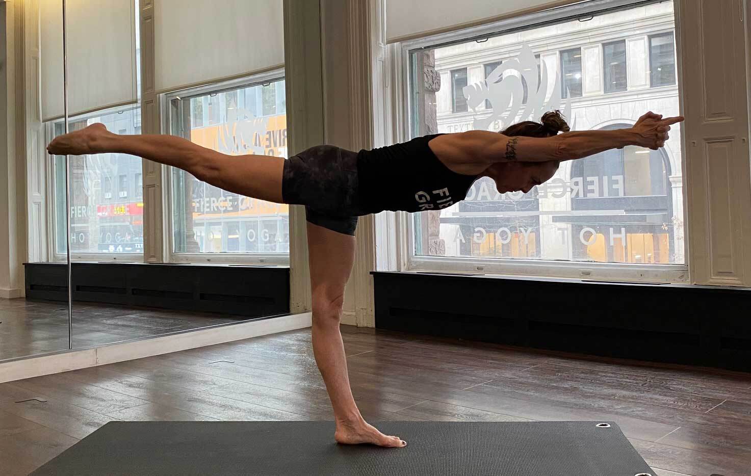 Anti-ageing Yoga Poses - balancing stick